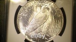 1922 Peace Dollar, MS63, limited edition Wayne Miller signed label