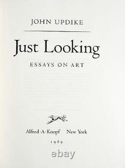 John Updike / SIGNED LIMITED JUST LOOKING ESSAYS ON ART Limited 1st #296322